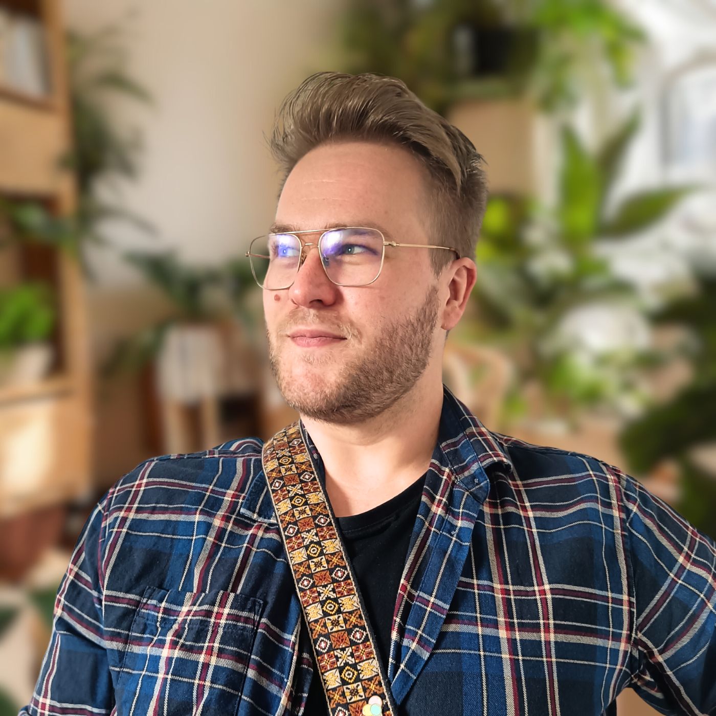 James Gale 2024 headshot – a portrait of the artist and writer known for his storytelling and evocative acrylic paintings. Capturing his creative essence, this professional photo represents the artist holding his favorite guitar.